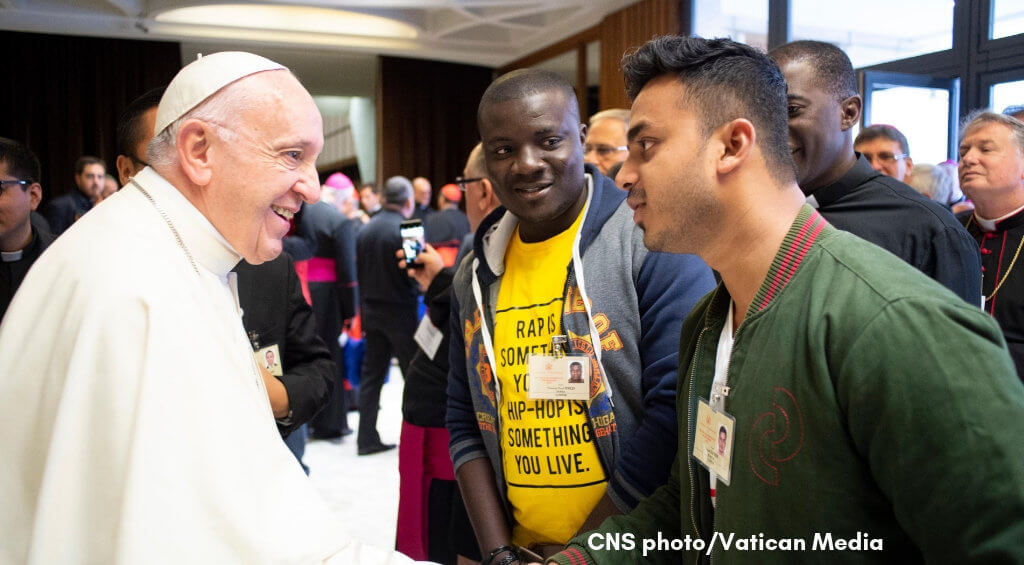 CNS photo of Pope Francis greeting youth delegates