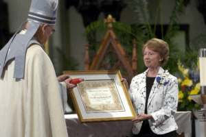 Bishop Hurley presents Sister Patrice Konwinski with the Pro-Ecclesia et Pontifice Medal by Pope Benedict XVI