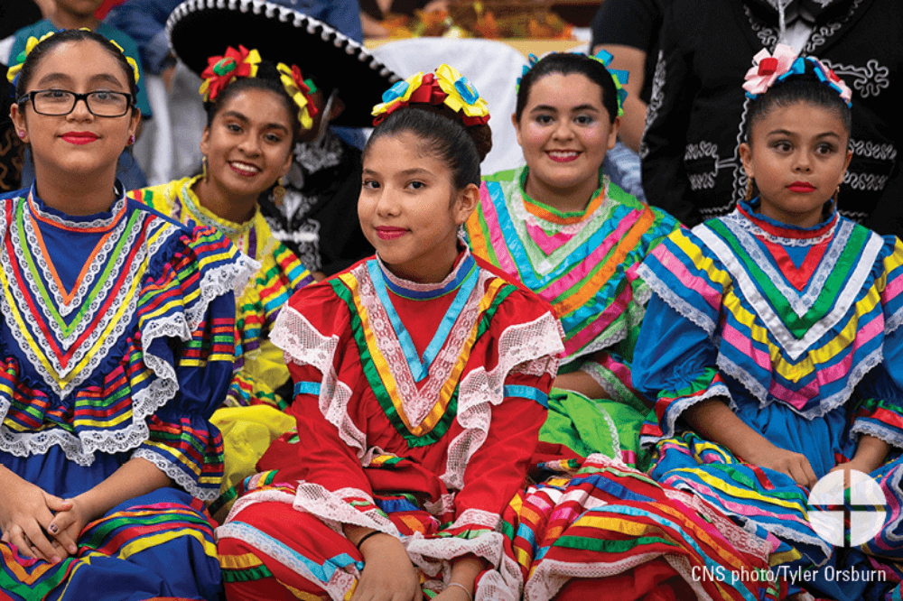 Young women of Hispanic heritage in traditional dress, CNS image