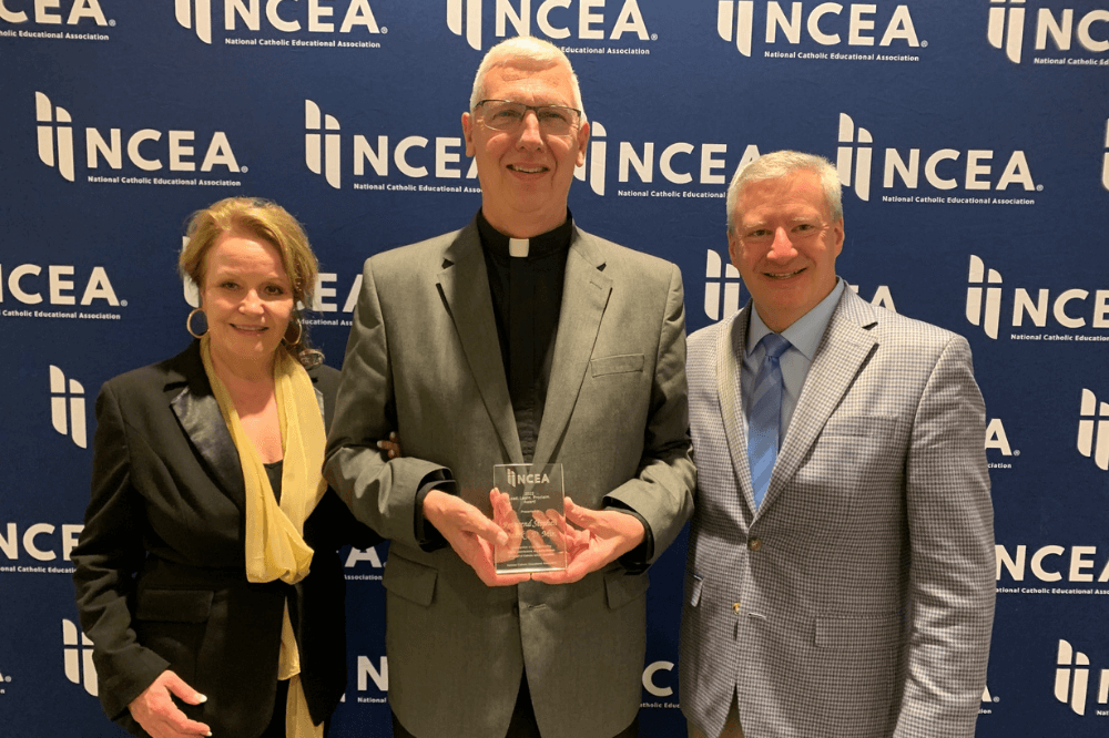 Father Dudek receives NCEA Lead. Learn. Proclaim Award, April 2022