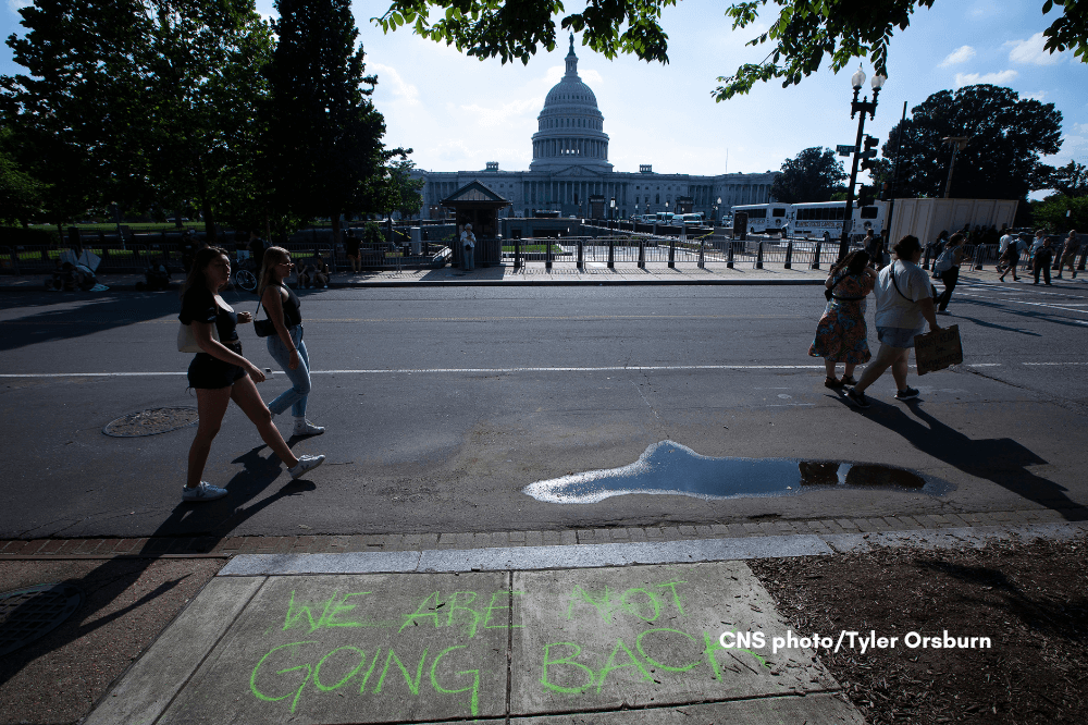 People are seen near the U.S. Capitol in Washington June 24, 2022, the day the Supreme Court overturned the landmark Roe v. Wade abortion decision. (CNS photo/Tyler Orsburn)