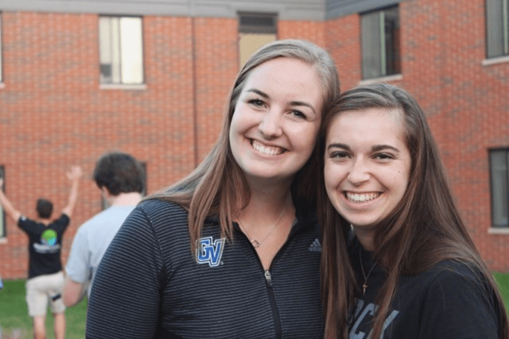 Two students at GVSU Laker Catholic kick-off 2018.