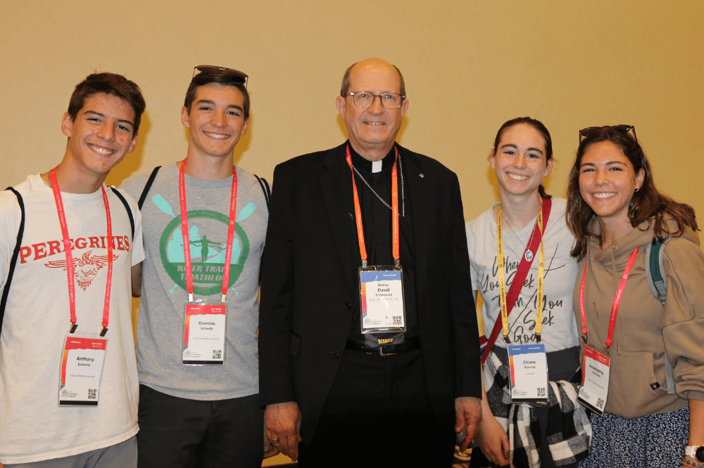 Bishop Walkowiak with members of the Schmitz family at the NEC 2024