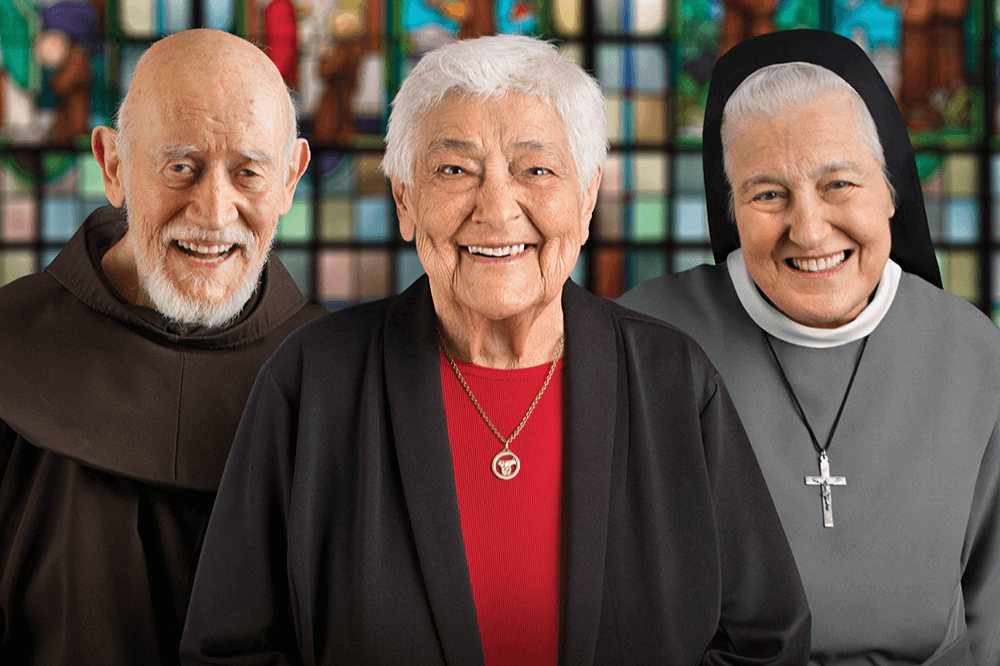 Retired priest and sisters smile