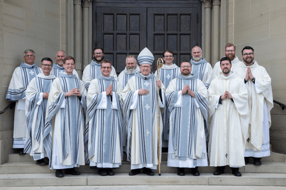 Bishop Walkowiak, Father Charlie Lediel, Father Logan McGahan, Father Hunter Ostapowicz with celebrants following ordination Mass.